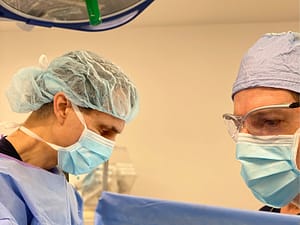 Dr. Bruno and Dr. Brown performing DC plastic surgery