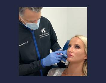 Dr. Bruno giving facial fillers