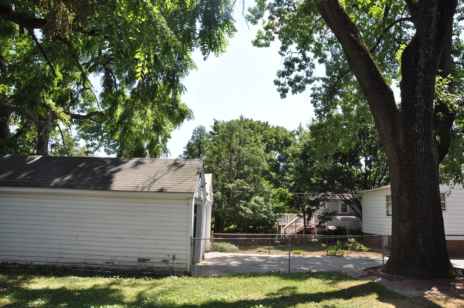 Tree removal after falling on garage in Maryland.